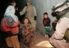 Irak: Weinendes Kind, dessen Vater un Mutter soeben von US-Soldaten ermordet wurden