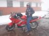 und sein Motorrad