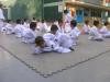 Die Kinder haben woechentliche Taekwon Do Stunden. Hier haben sie alle zusammen ein Examen