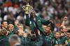 The president of South Africa, Mr. Thabor Mbeki presents the Cup