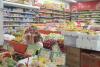 Anninka in a Chinese Grocery Store with  fruit called "Mangosting" (or that's what it sounds like