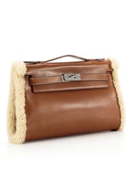 hermes_natural-shearling-kelly-muff_angle02_001_article_gallery_portrait