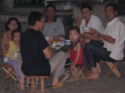 Family eating on the street